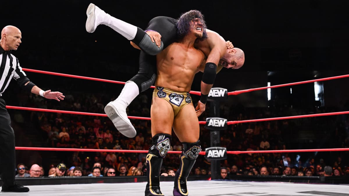 Ace Austin with Claudio Castagnoli on his shoulders on AEW Collision