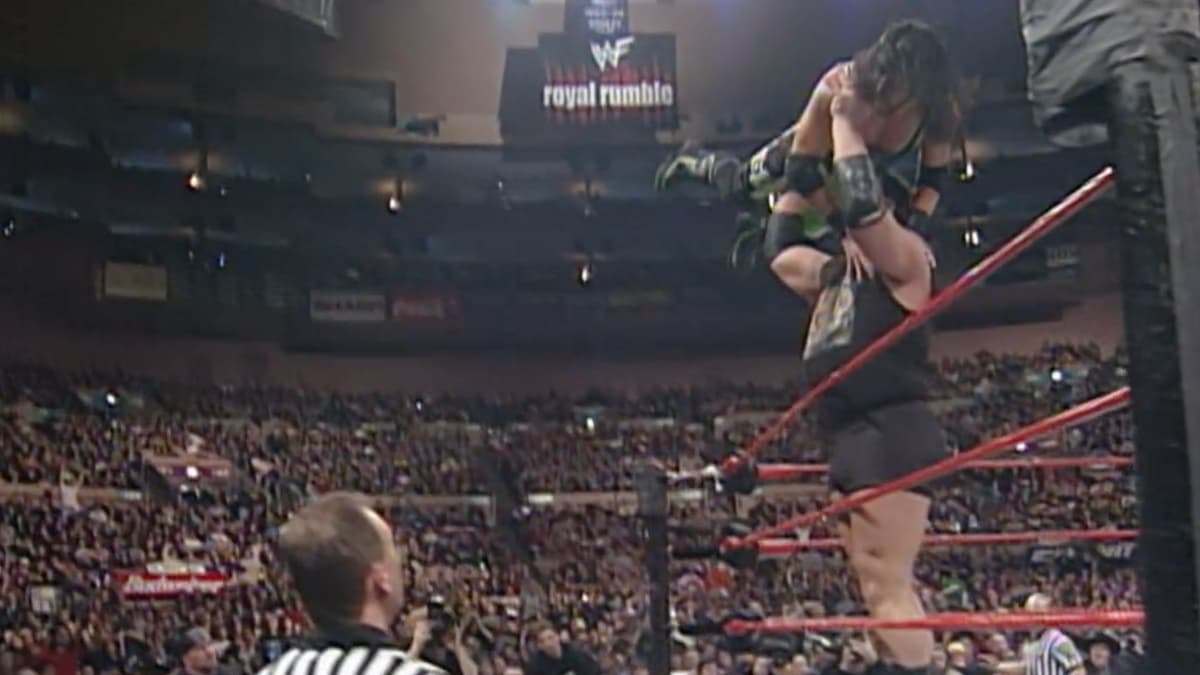 The Big Shop holding X-Pac up in a Gorilla Press