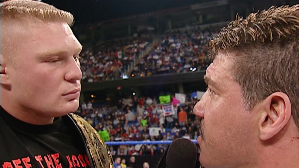 Brock Lesnar and Eddie Guerrero staring at each other on WWE SmackDown