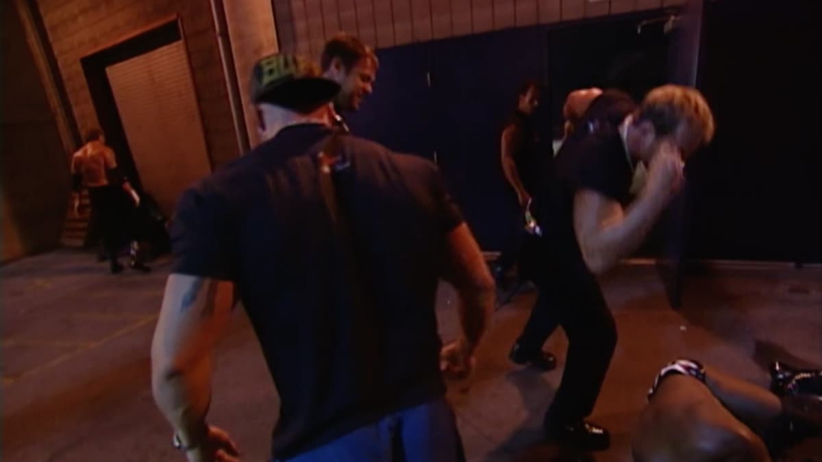 Buff Bagwell and a group of WCW talents standing around after attacking The Undertaker on WWE SmackDown