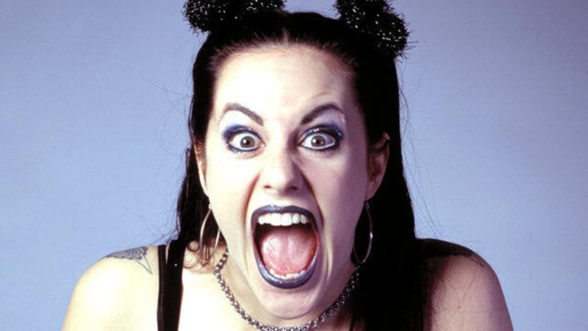 WCW star Daffney pulls a wild facial expression for a backstage photo