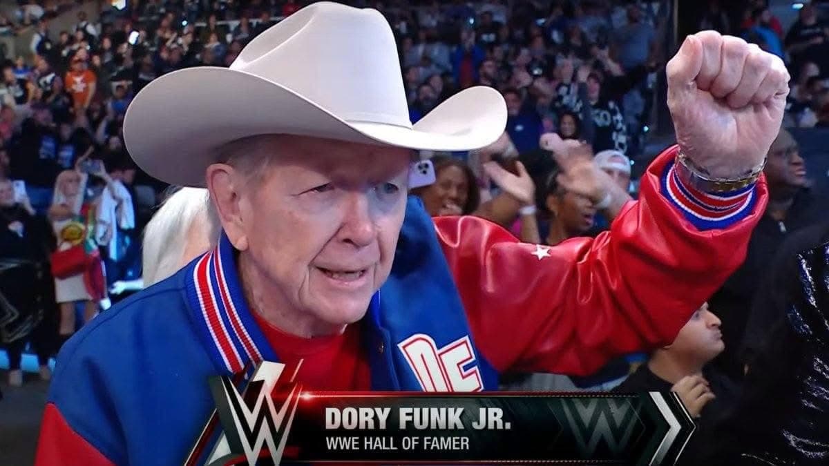 Dory Funk Jr. in a cowboy hat with his fist raised