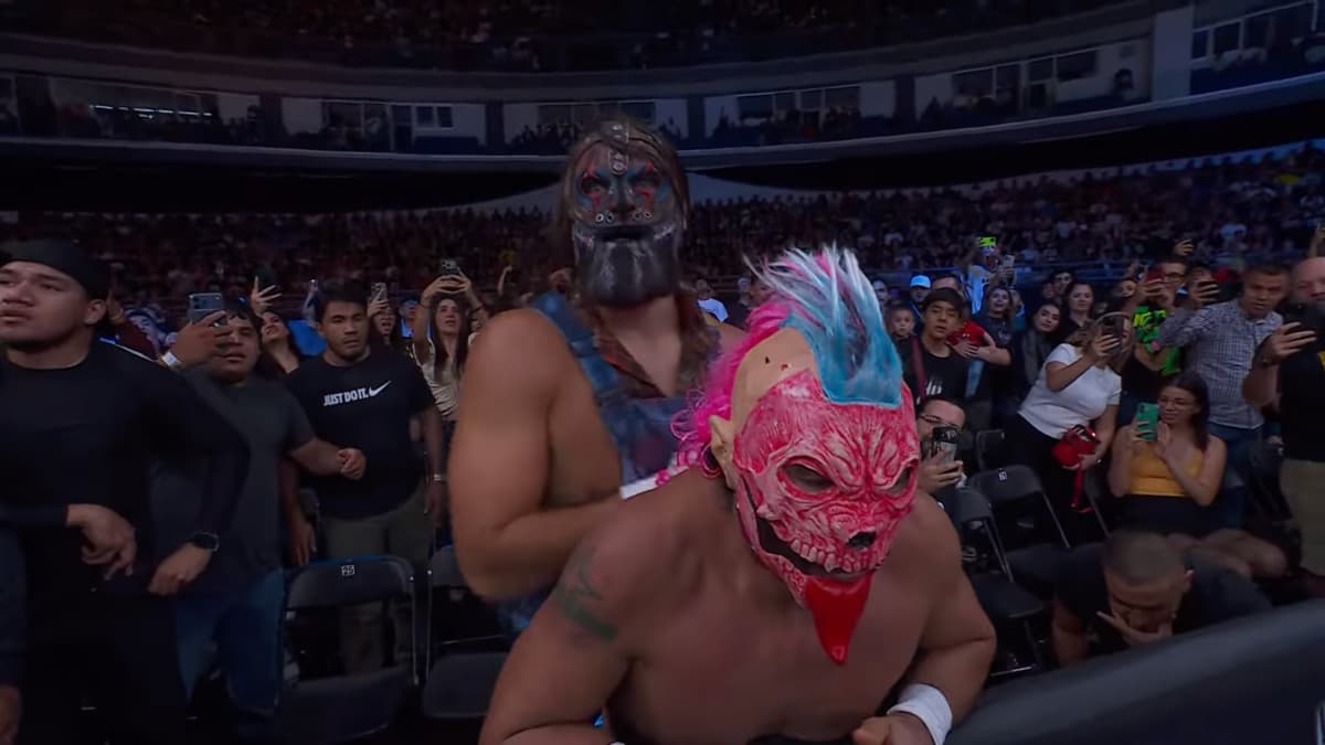 Drake Morreaux in a Leatherface mask attacking Psycho Clown in AAA