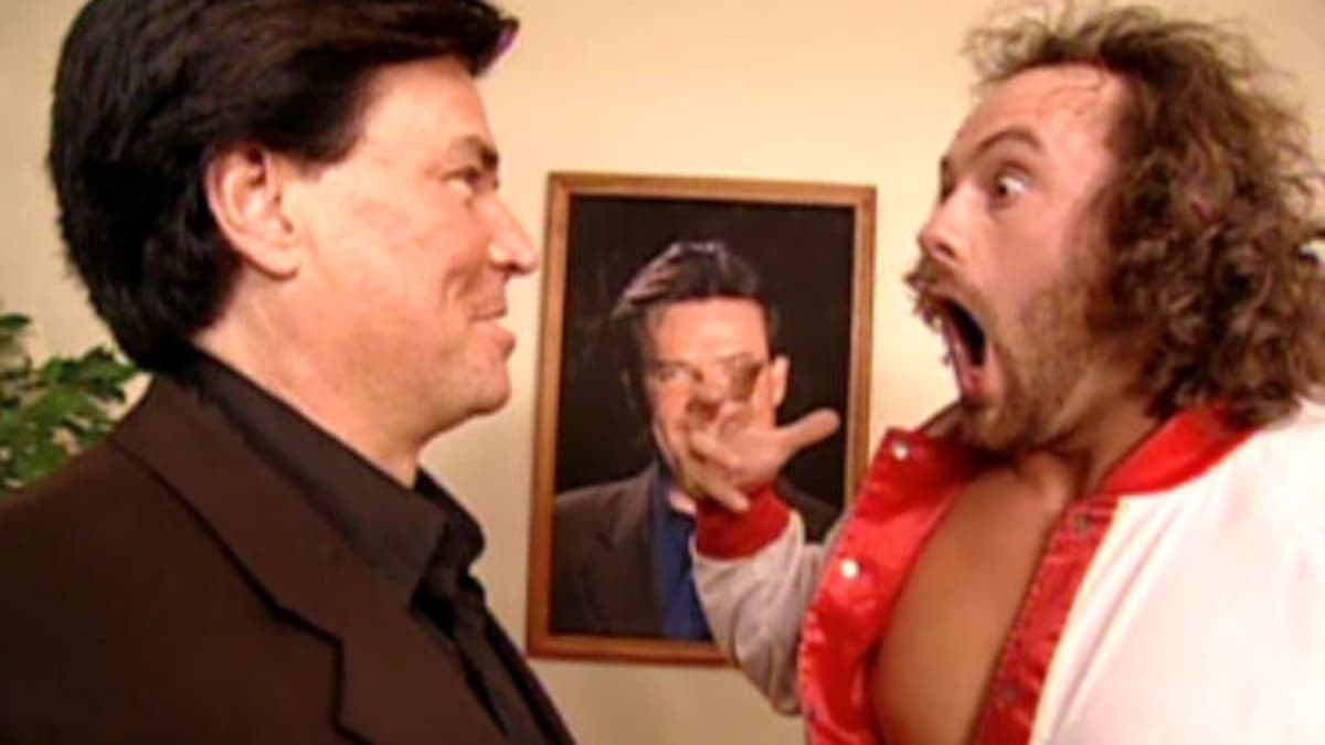 Eugene looking shocked while facing Eric Bischoff