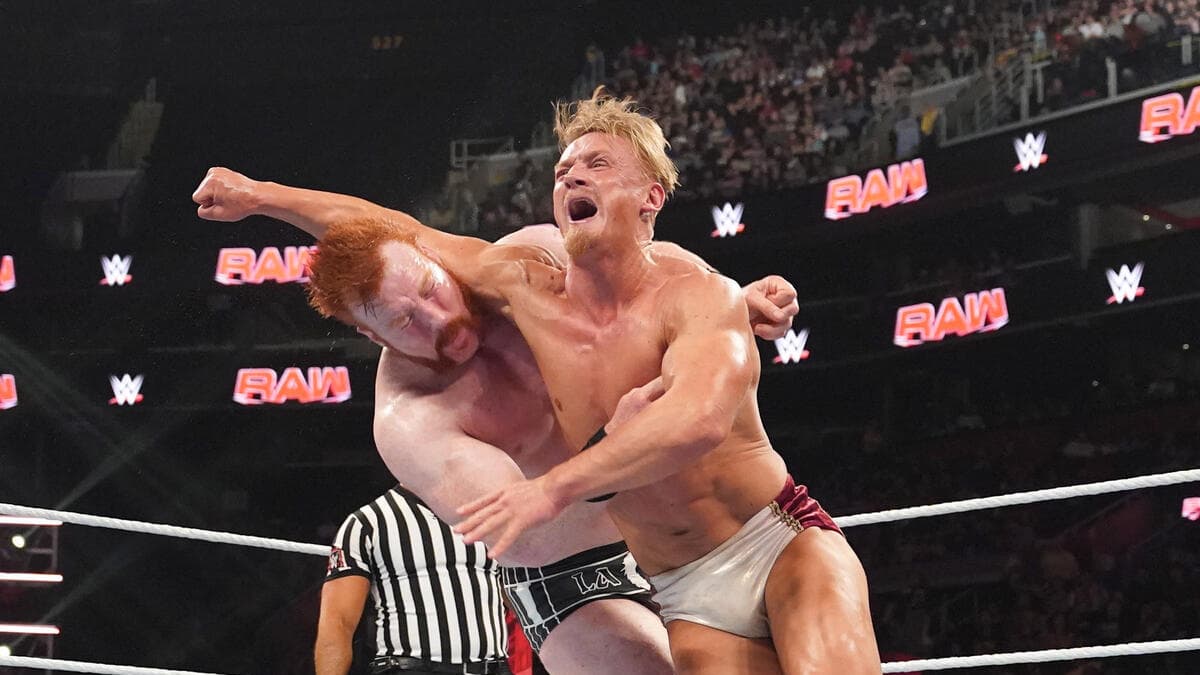 Ilja Dragunov hitting Sheamus with a lariat
