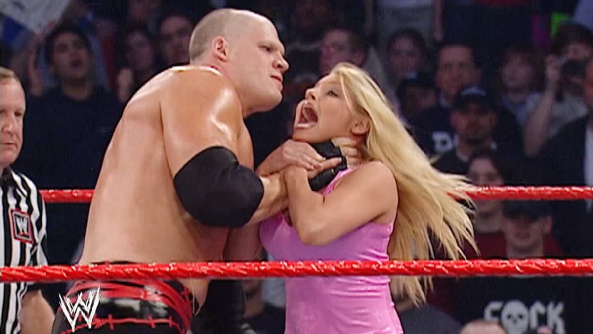 Kane with his hand around Trish Stratus' throat