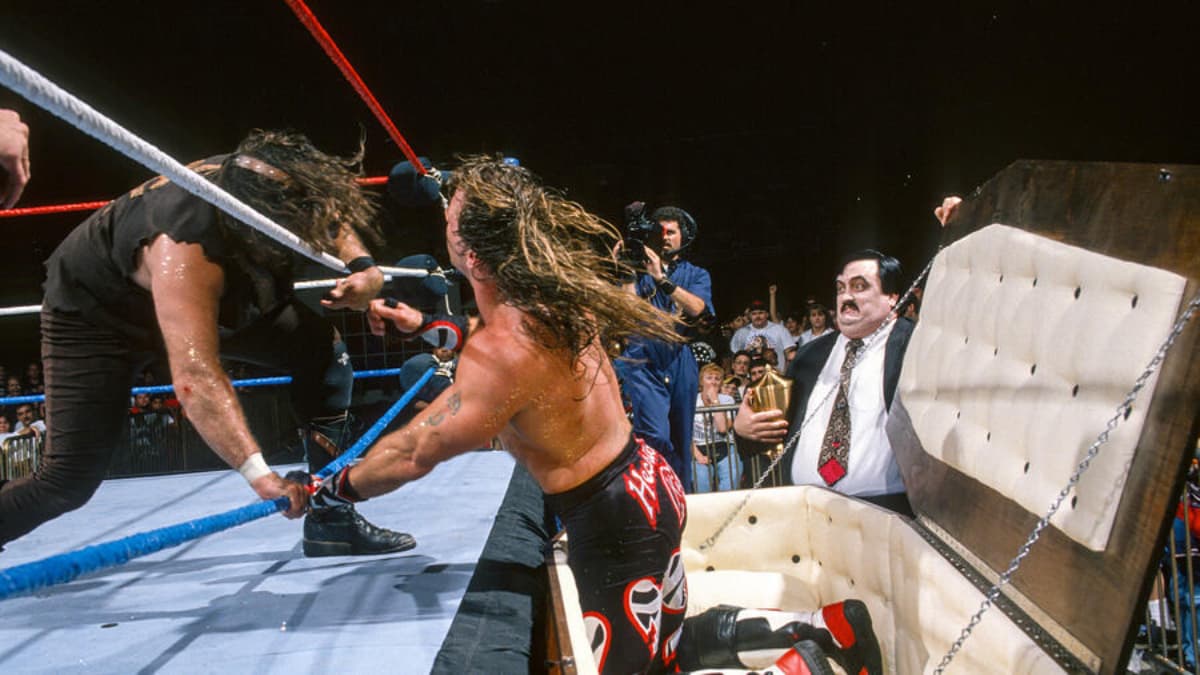 Shawn Michaels from a casket punching Mankind