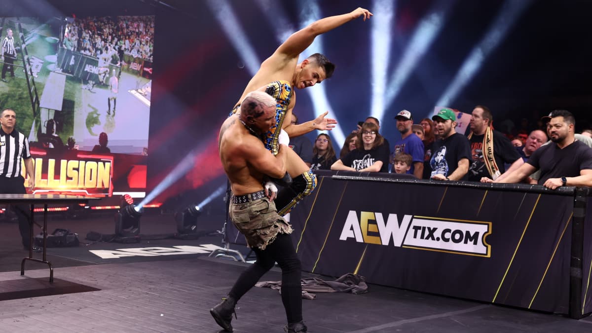 Sammy Guevara connecting with a jumping knee to Darby Allin 