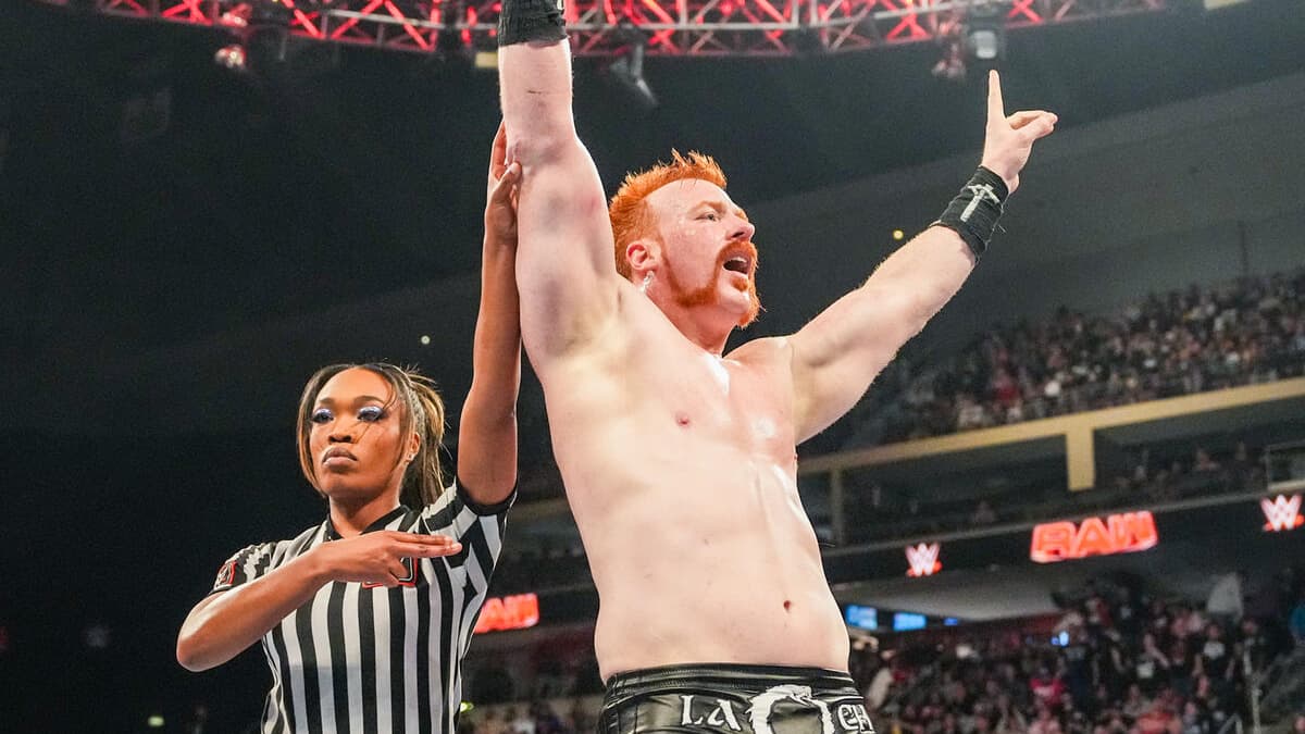 Sheamus celebrating as the referee points at him