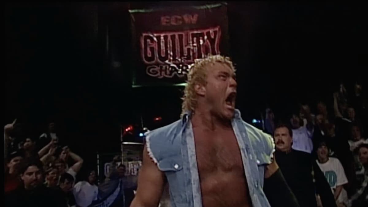 Sid Vicious shouting in a denim vest at ECW Guilty as Charged 1999