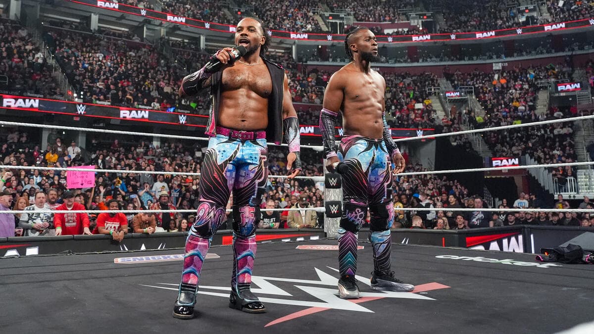 Xavier Woods and Kofi Kingston cutting a promo in the middle of the ring on WWE Raw in February 2025