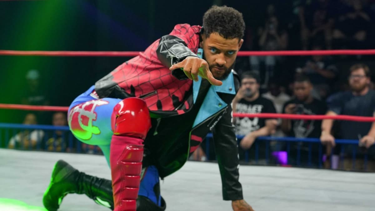 Trey Miguel posing during his entrance in TNA