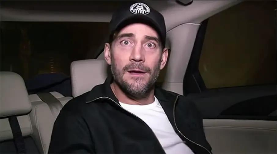 21938 cm punk in car