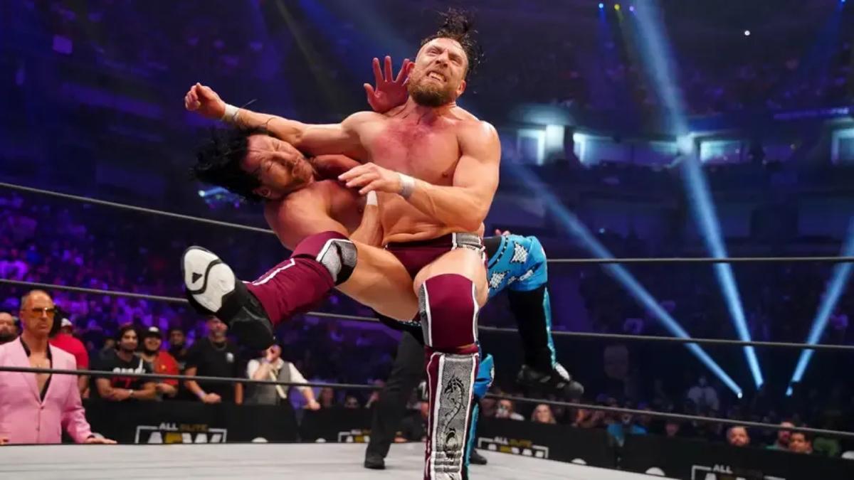 Bryan Danielson clotheslining Kenny Omega at AEW Dynamite Grand Slam 2021