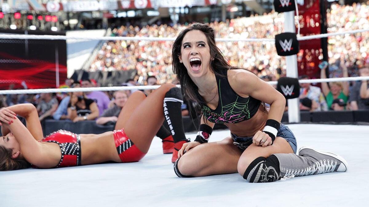 AJ Lee celebrating her win at WWE WrestleMania 31