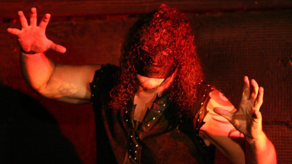 TNA star Abyss poses with his arms out in a backstage photo circa 2005