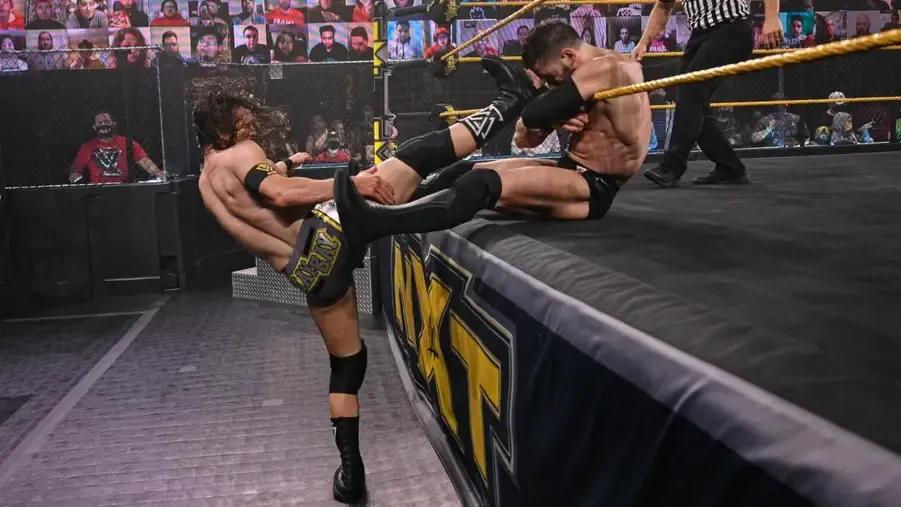 Adam Cole leg slap.jpg