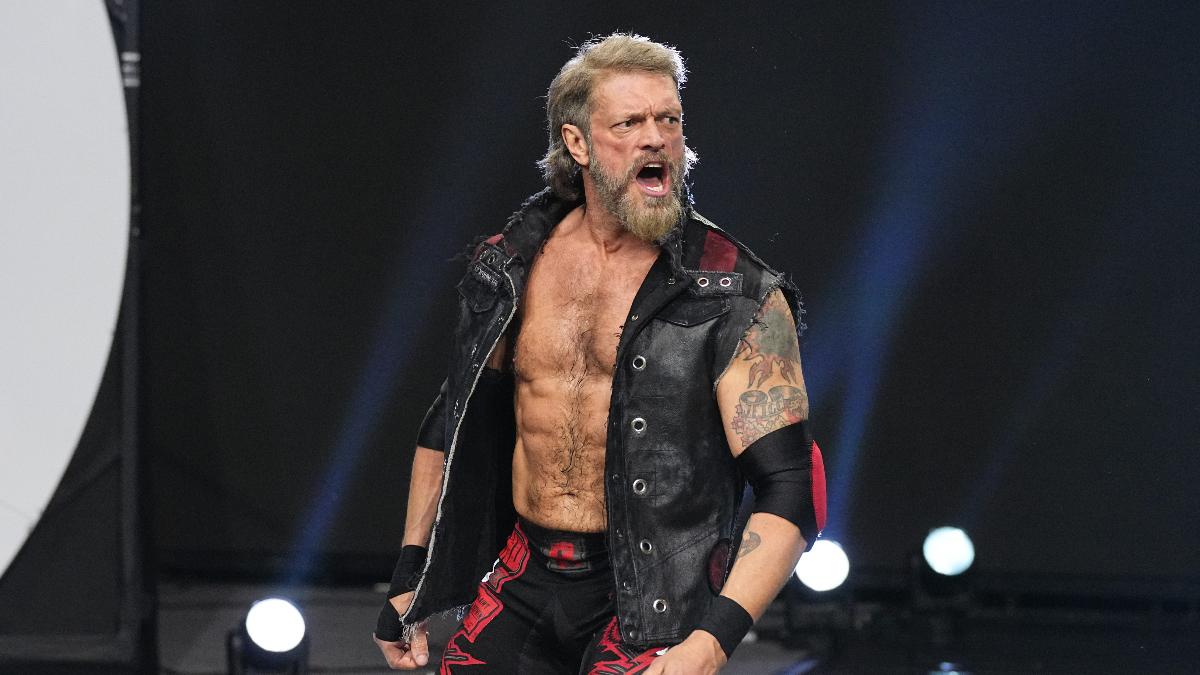 Adam Copeland on AEW Dynamite in January 2024 wearing a black vest and red and black pants