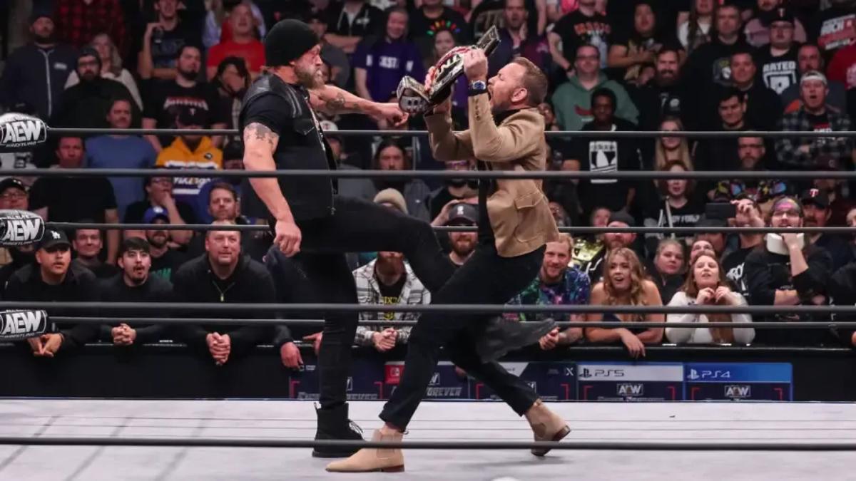 Adam Copeland kicking Christian Cage in the nether regions