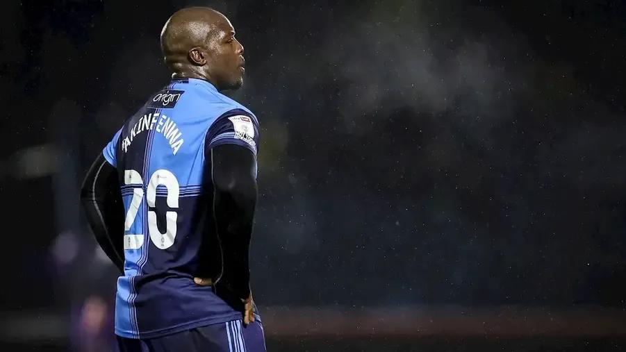 Adebayo Akinfenwa in the rain.jpg