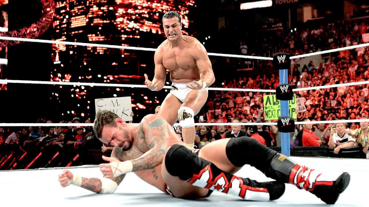 Alberto Del Rio encouraging CM Punk to get up at WWE SummerSlam 2011
