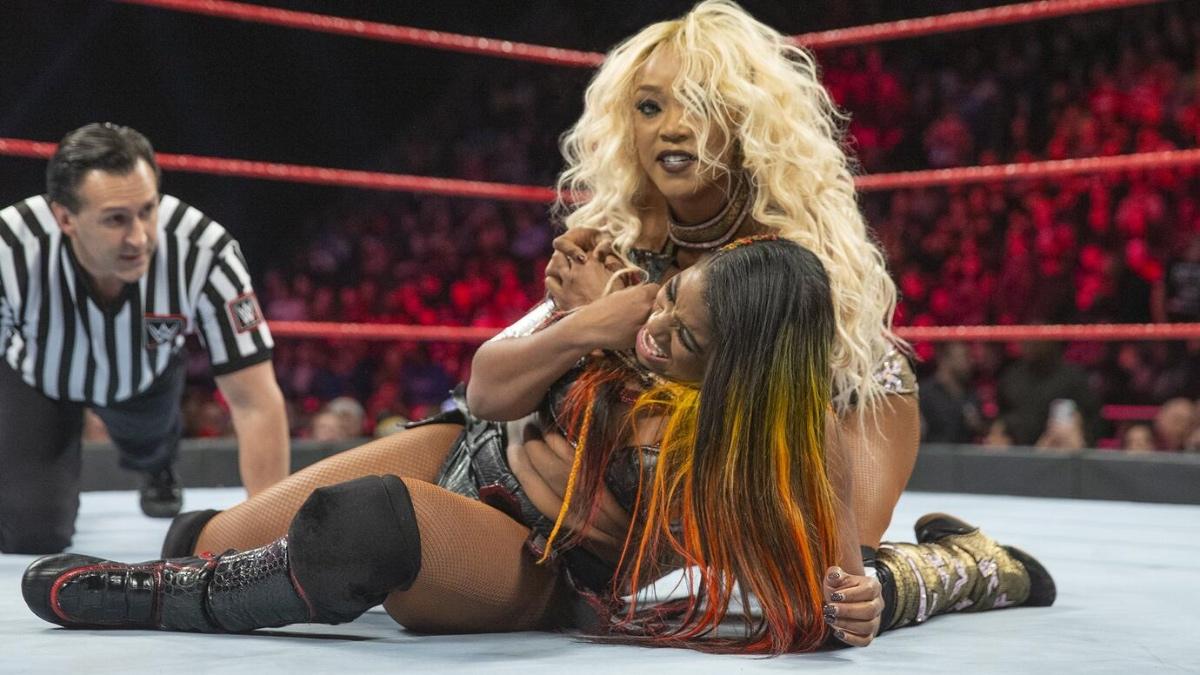 Alicia Fox with a submission on Ember Moon in the ring on WWE Raw