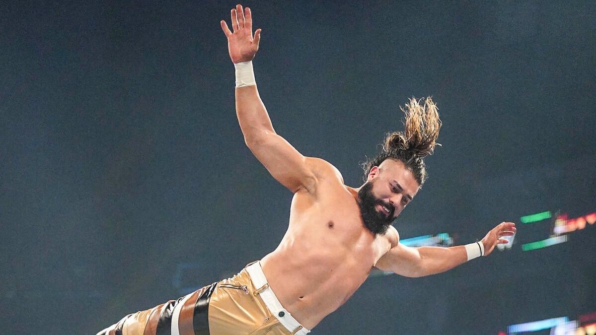 Andrade hitting a Crossbody on WWE SmackDown
