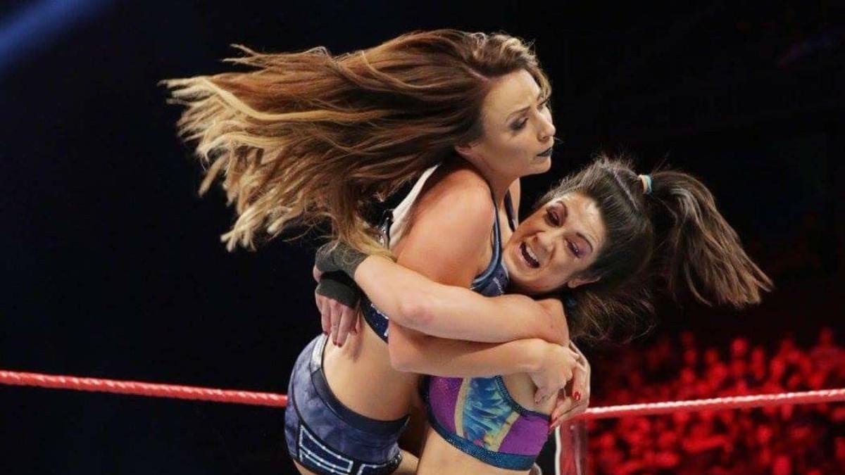 Bayley hitting her Bayley to Belly Suplex finisher