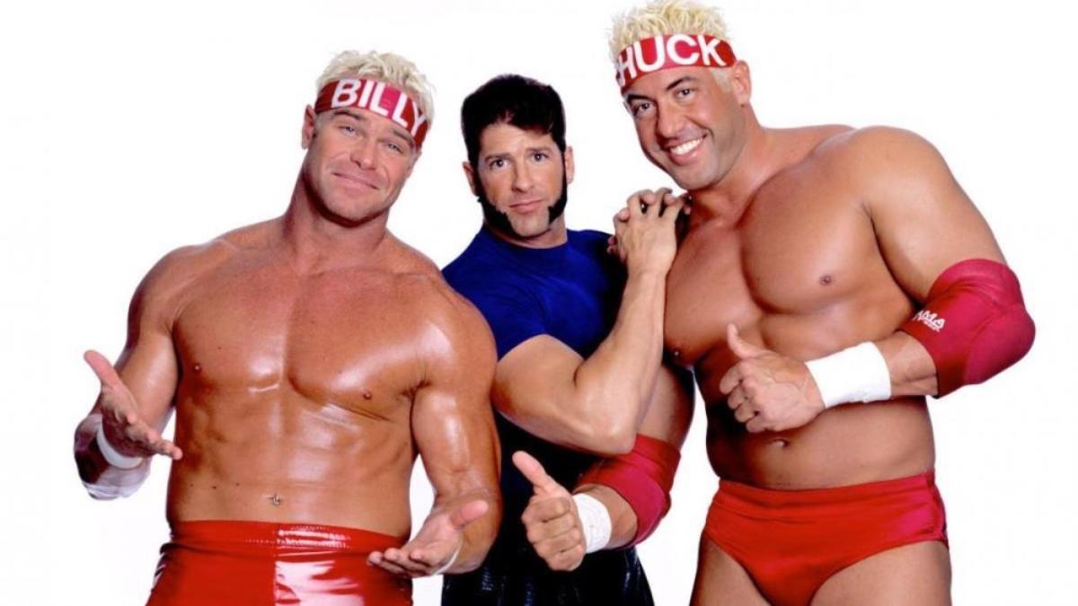 Billy and Chuck in red underpants and headbands with Rico in the middle in a blue shirt