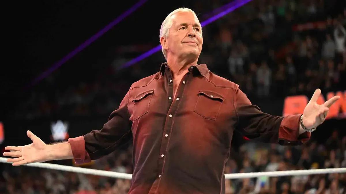 Bret Hart poses in the middle of the ring following his WWE return in September of 2024.