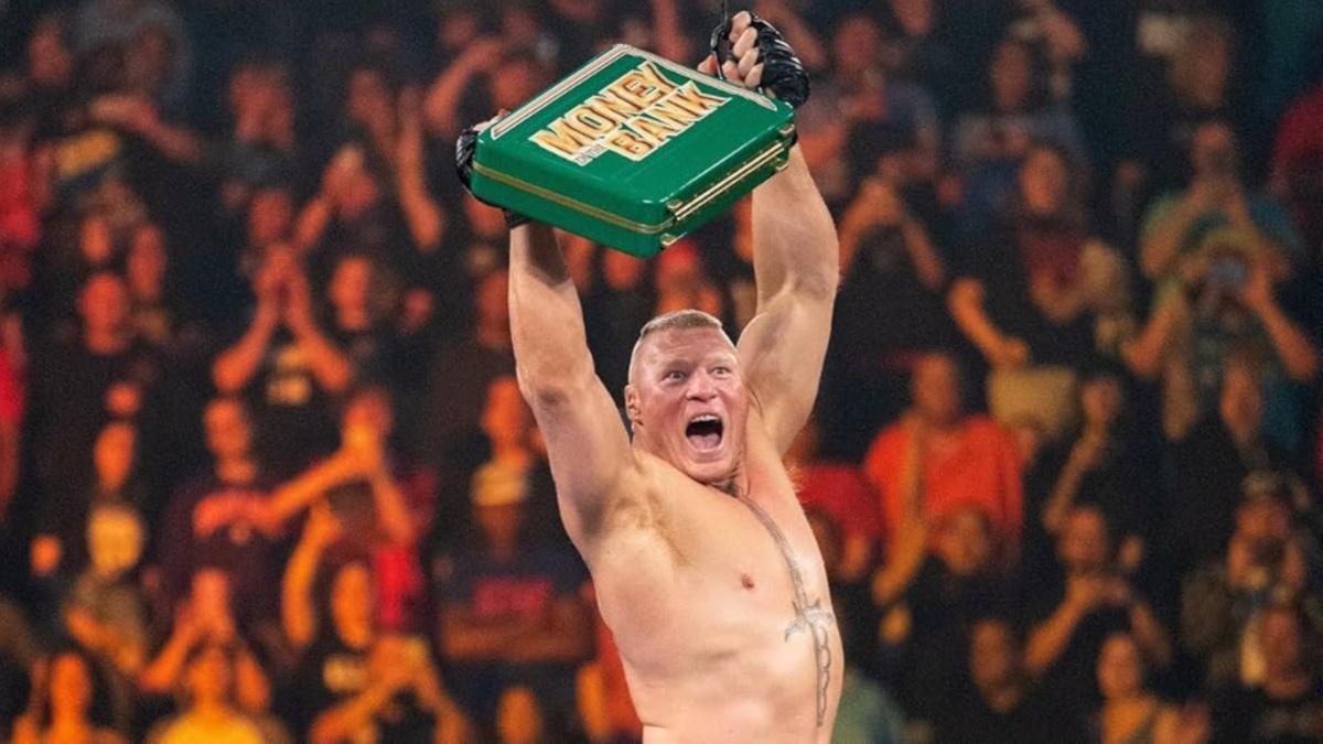 Brock Lesnar with a wild face as he grabs Money In The Bank briefcase