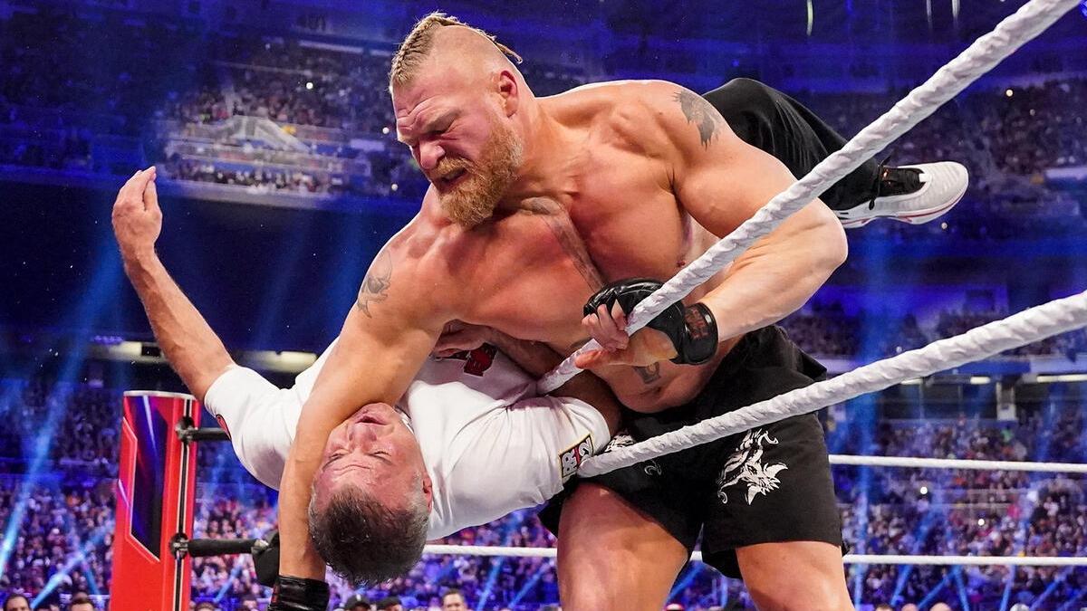 Brock Lesnar clotheslining Shane McMahon over the top rope at Royal Rumble 2022