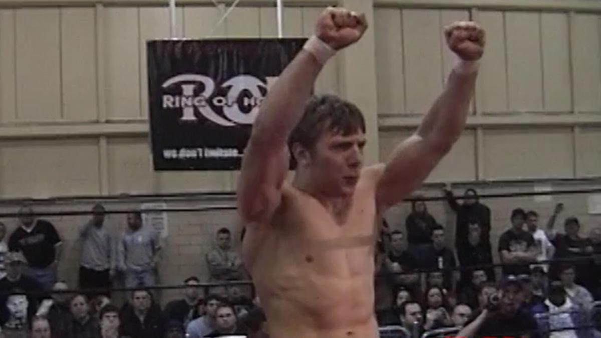Bryan Danielson with his arms up at ROH Era of Honor Begins