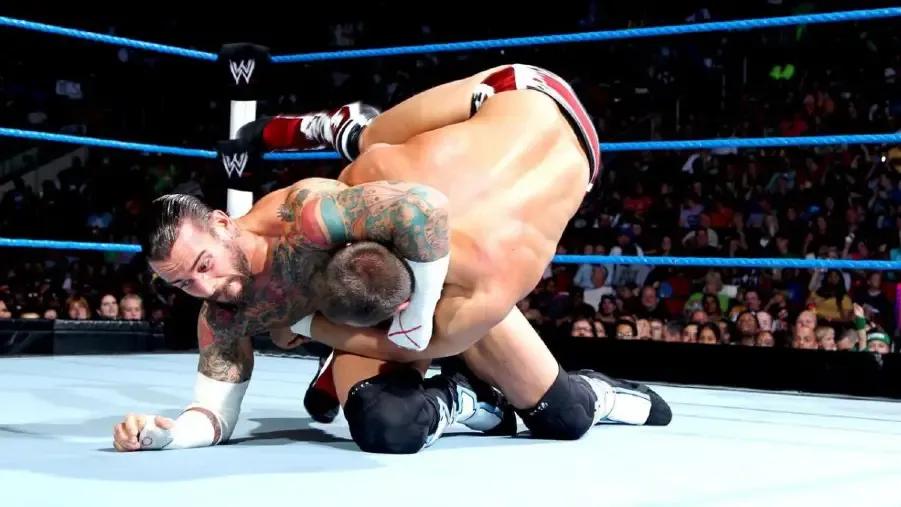 CM Punk Daniel Bryan Over the Limit 2012.jpg