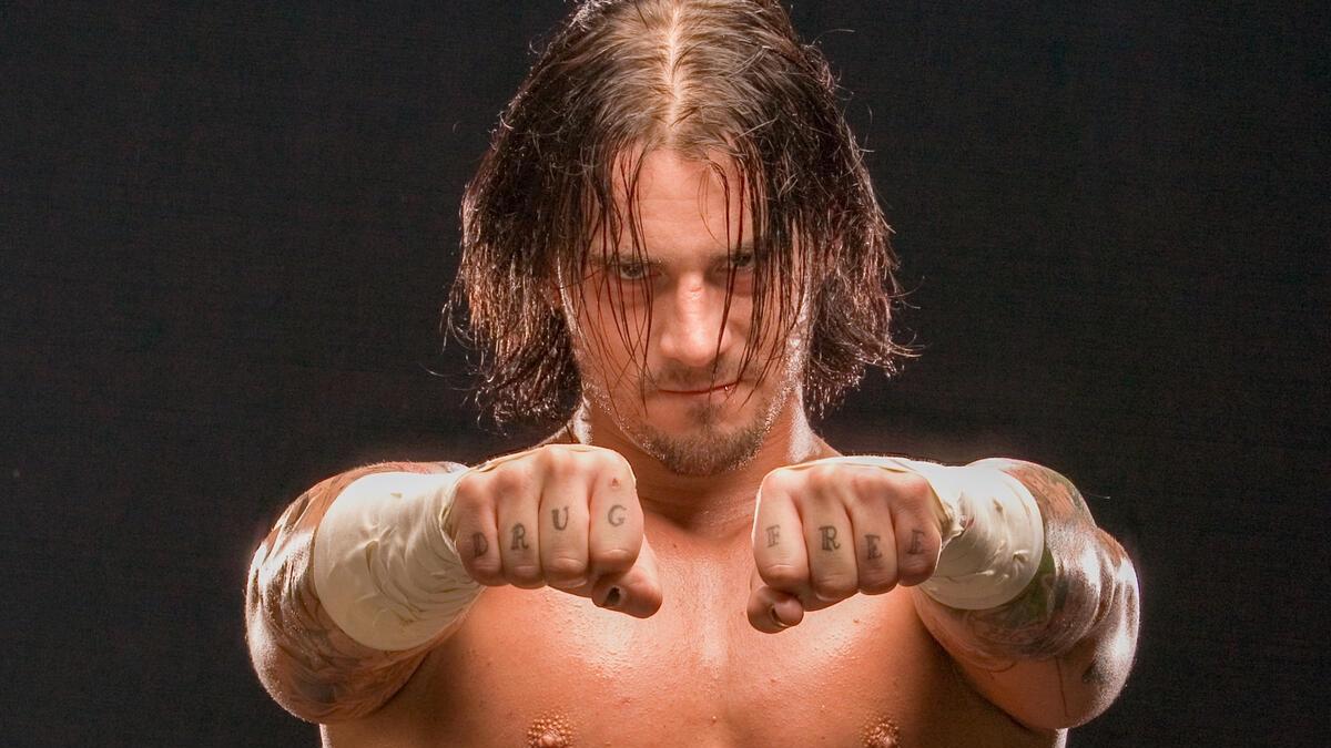 CM Punk with his fists out in 2006