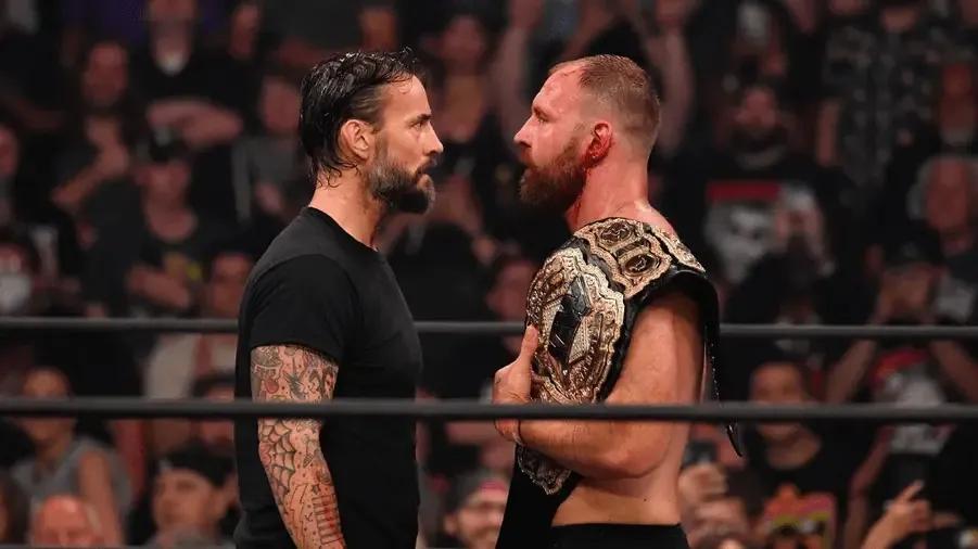 CM Punk Return Jon Moxley face to face.png