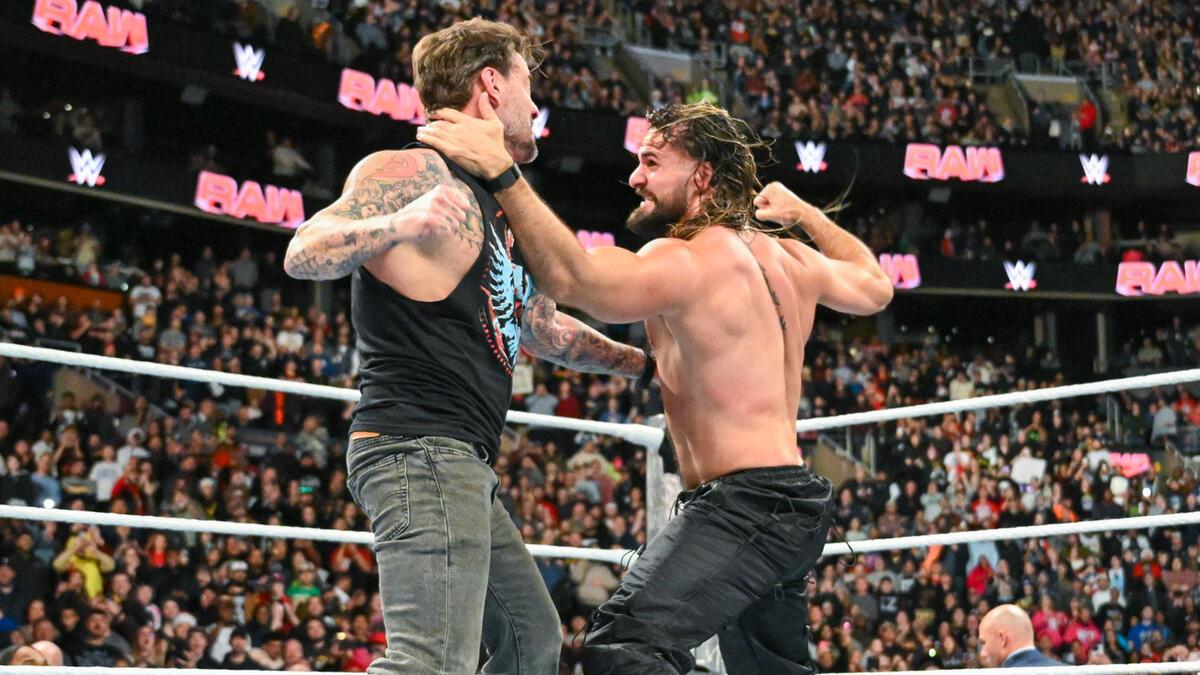 CM Punk and Seth Rollins brawling on December 16, 2024 episode of WWE Raw