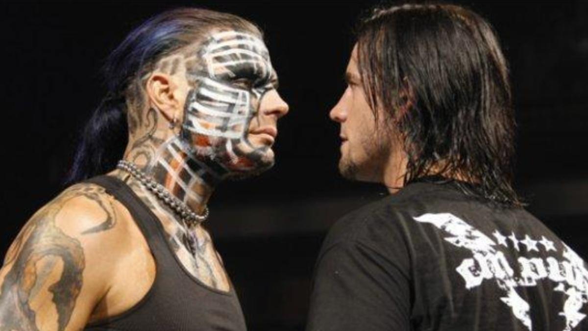 CM Punk and Jeff Hardy standing face to face 