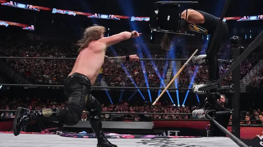 Chris Jericho Adam Cole Double or Nothing yeeted chair.jpg