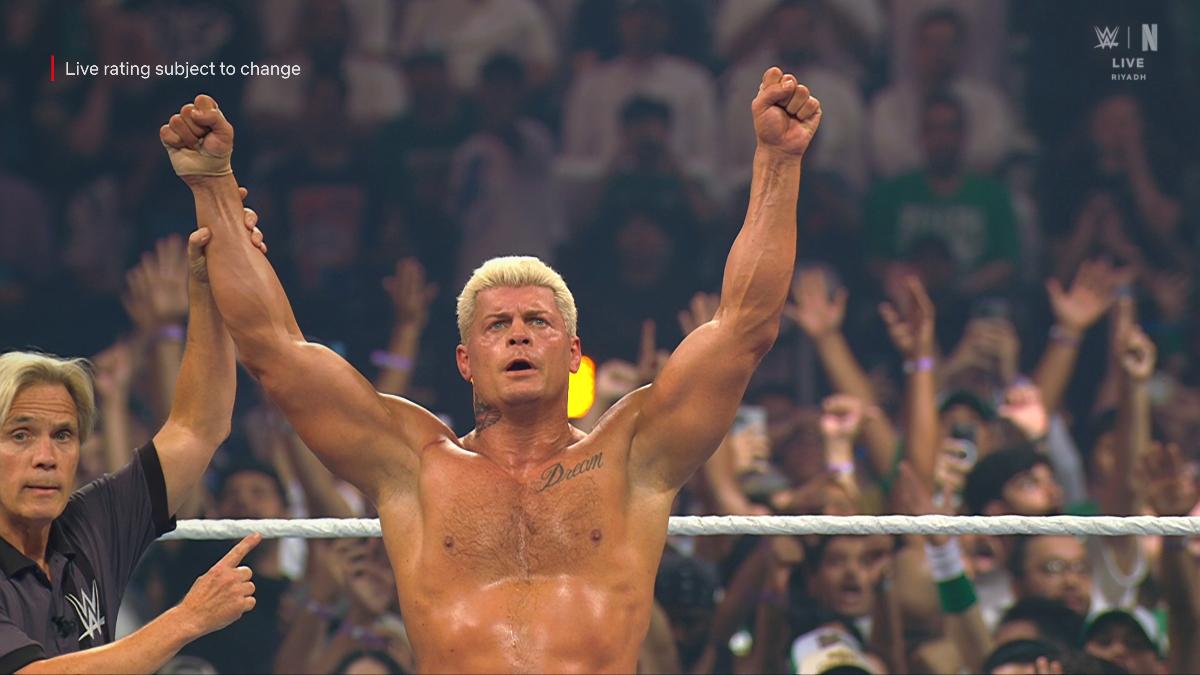 Cody Rhodes with his arm raised at WWE Night of Champions
