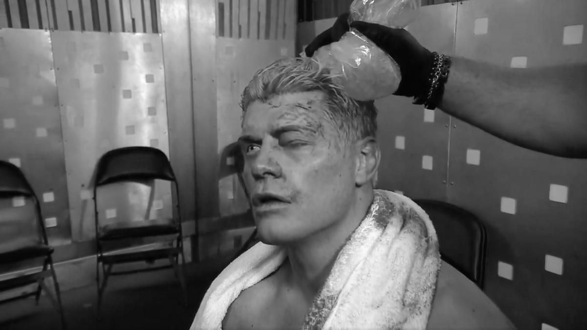 A bloody Cody Rhodes with a swollen eye, attended to by medical staff backstage at WWE WrestleMania 42