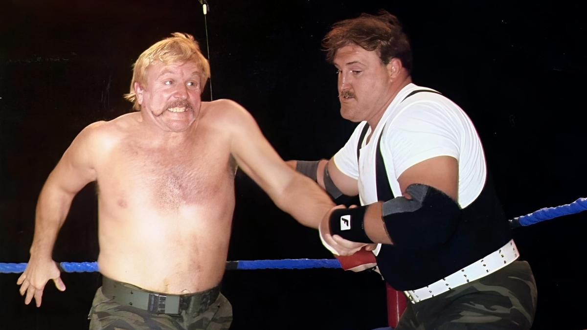 Sergeant Slaughter gives Colonel DeBeers an Irish whip during a match for the AWA in the 1980s 