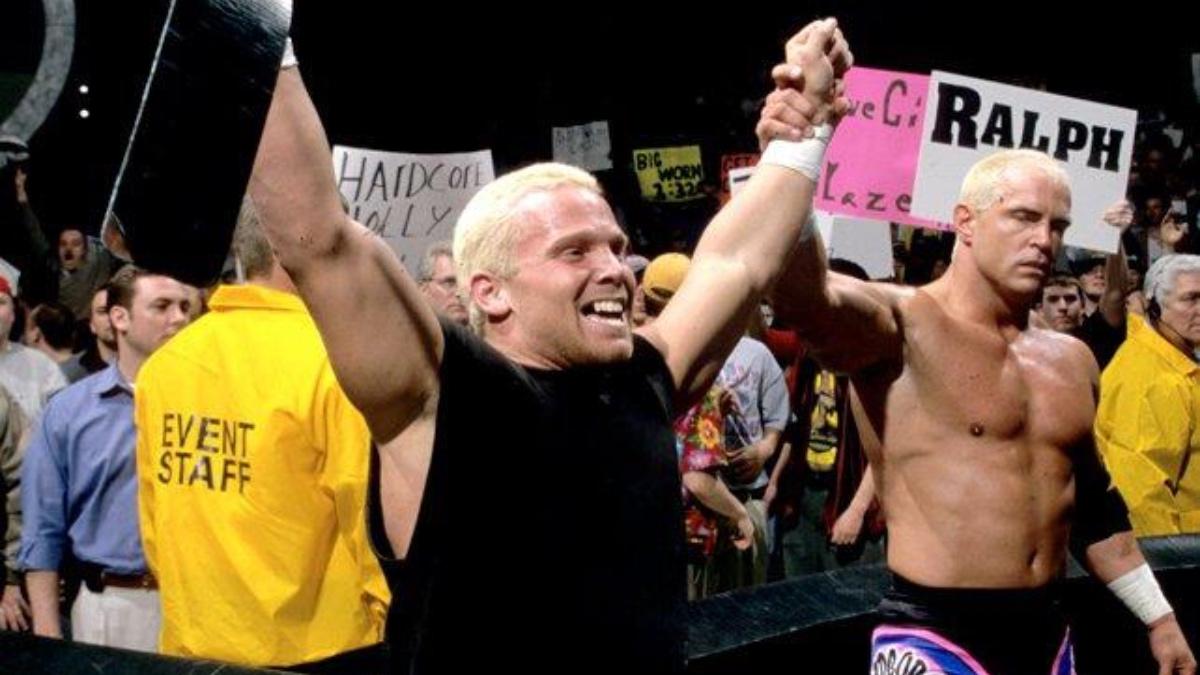 Crash Holly having his arms raised by Hardcore Holly