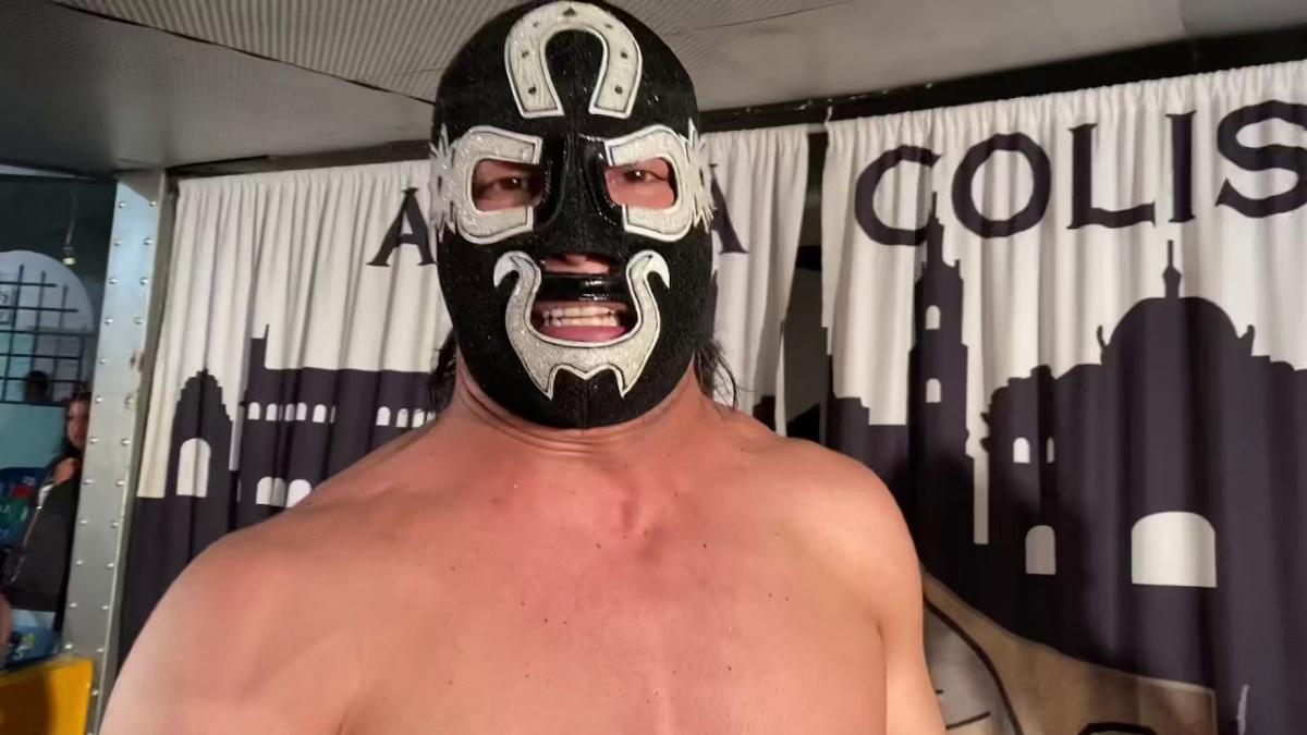 Cuatrero in his mask cutting a promo