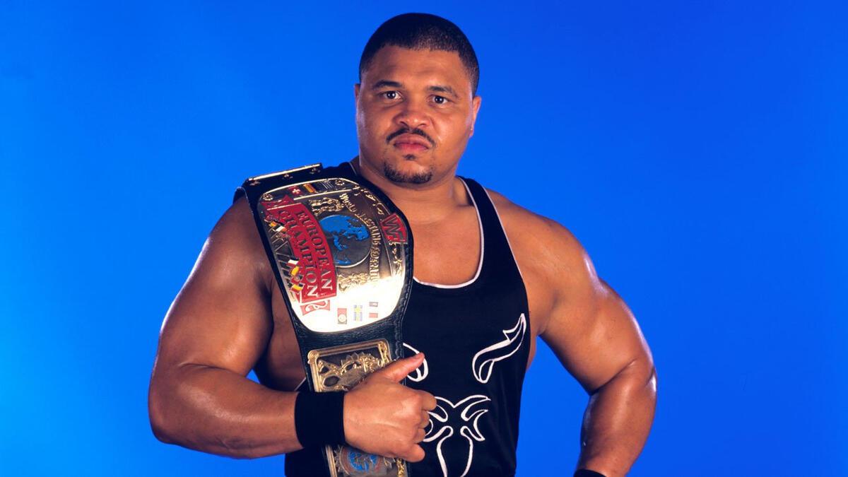 A studio shot of D'Lo Brown holding the WWE European Championship belt circa 1998