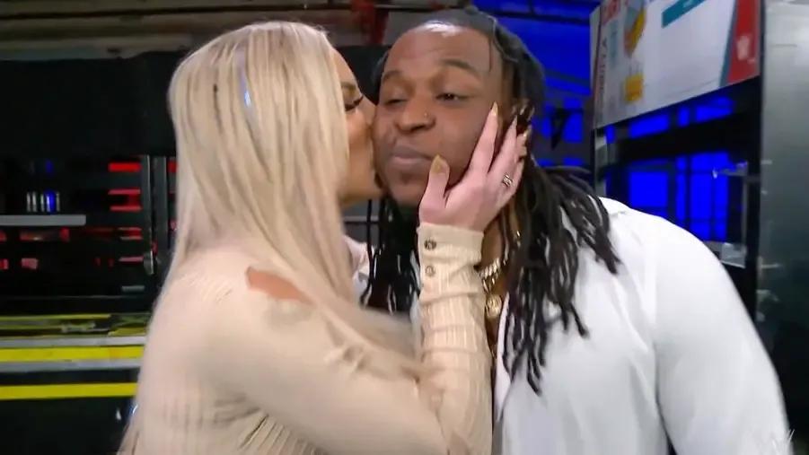 Dana Brooke Reggie sloppy kiss.jpg