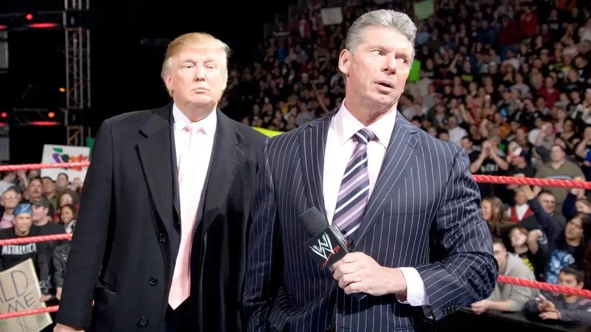 Donald Trump and Vince McMahon stand together in the ring during an episode of WWE Raw from 2007.