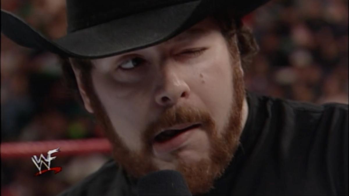 Eddie Ferrara doing an impersonation of Jim Ross' Bells Palsy condition 