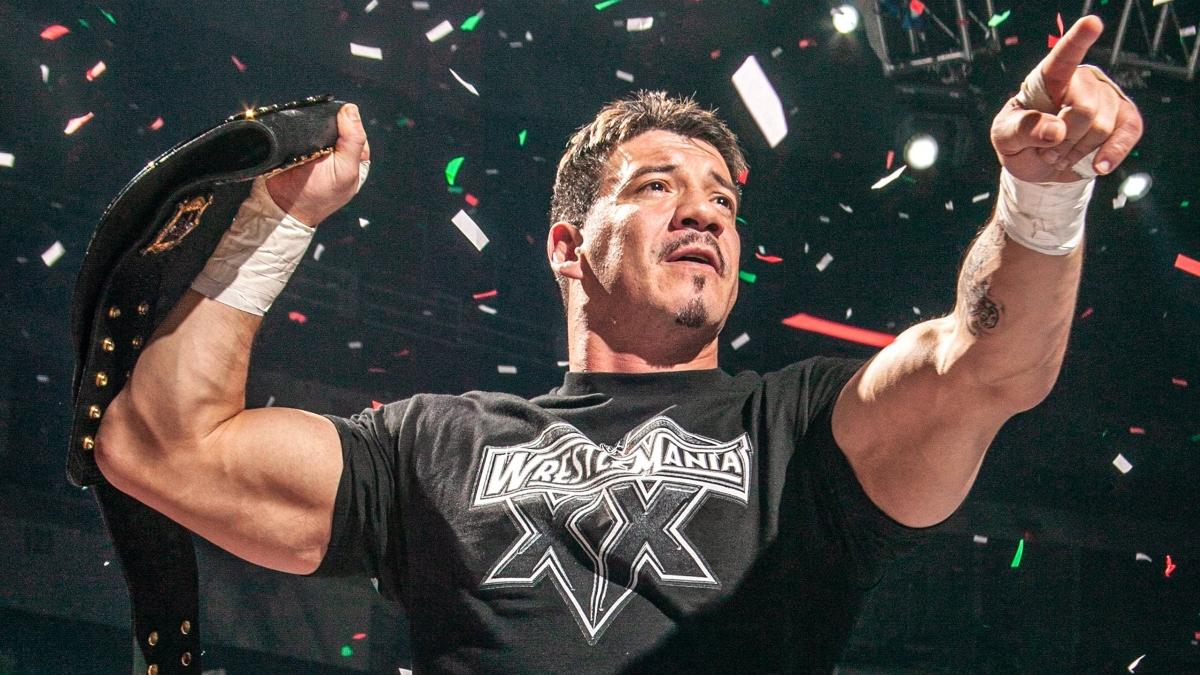 Eddie Guerrero celebrates winning the WWE Championship on an episode of SmackDown following his title victory