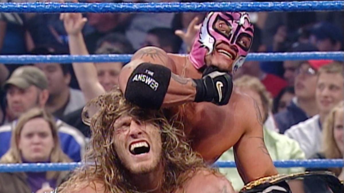 Edge and Rey Mysterio celebrating together on SmackDown 